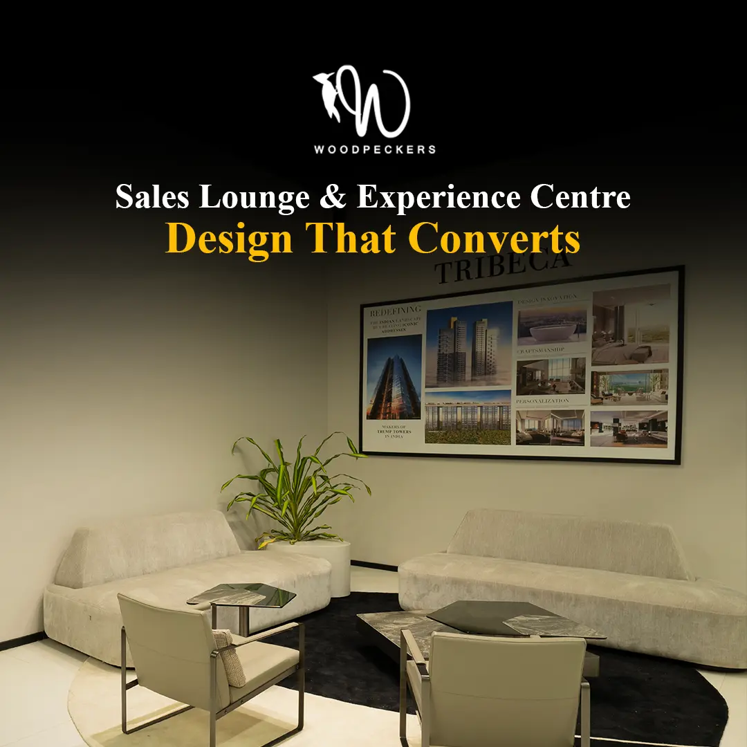 Modern real estate sales lounge and experience centre interior featuring minimalist white sofas and a large architectural display board for Tribeca, demonstrating high-converting design by Woodpeckers.