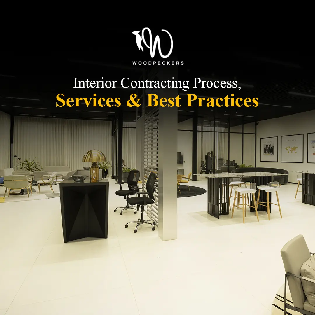 A finished modern commercial office interior featuring custom workstations, collaborative seating, and sleek glass partitions, demonstrating high-quality interior contracting execution by Woodpeckers.