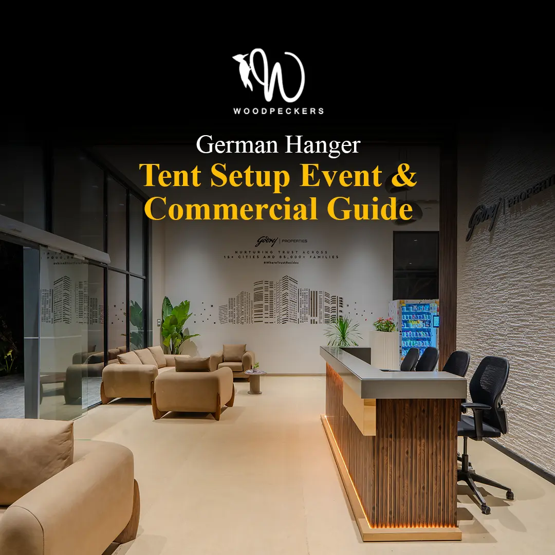 High-end corporate reception interior with a wooden desk and lounge seating, demonstrating the premium finishes achievable inside a commercial German Hanger tent setup by Woodpeckers.
